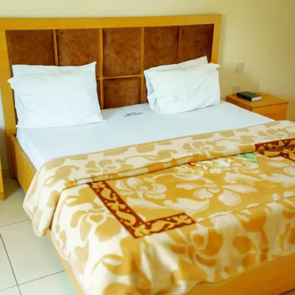 Deluxe Bedroom shot of Carter Conlon Center & Resort In Jos Nigeria