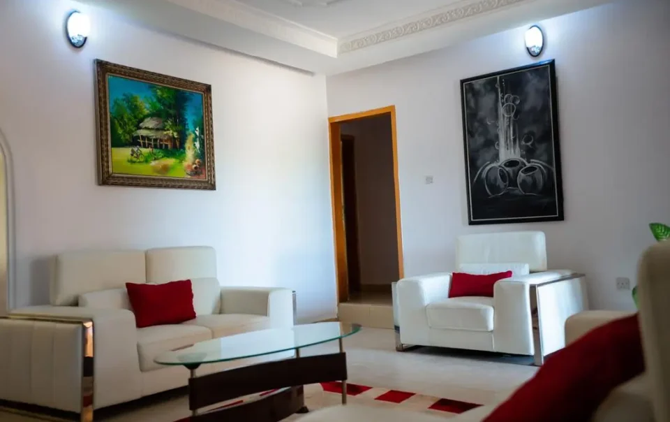 Sitting area of Carter conlon resort in Jos featuring white counches and center table